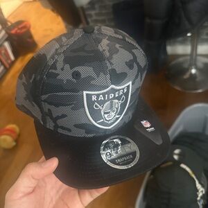 New Era Black and Gray Raiders Snapback Hat